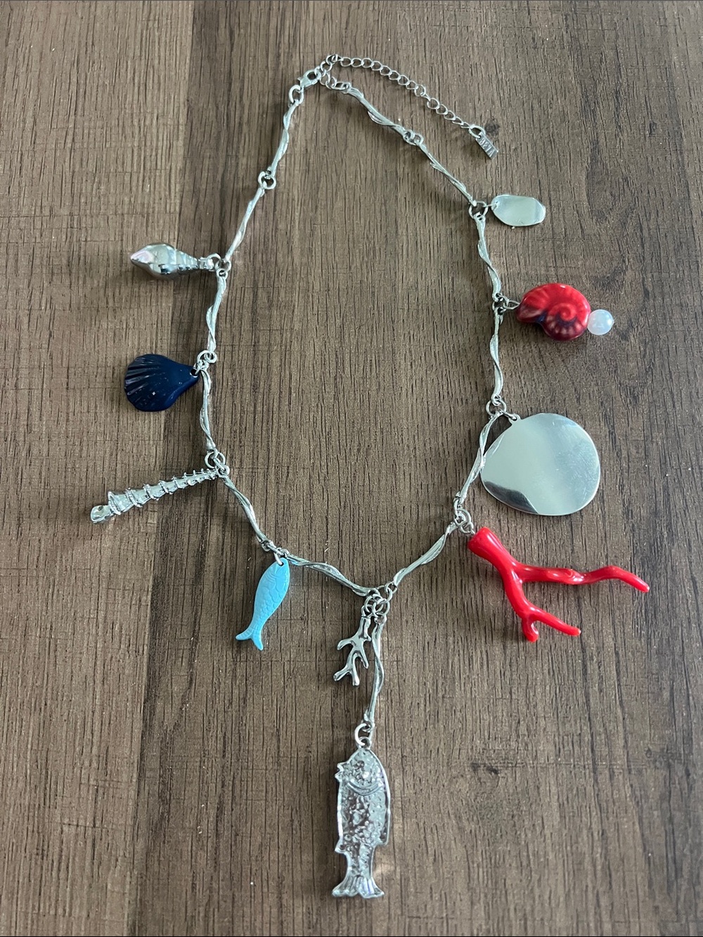 Silver Charm Necklace with Red Coral & Blue Fish Accents